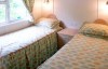 wales log cabin twin bedroom