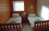 Rudyard Lake Lodges twin bedroom